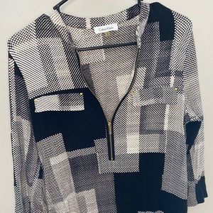 Calvin Klein black and white half-zip shirt